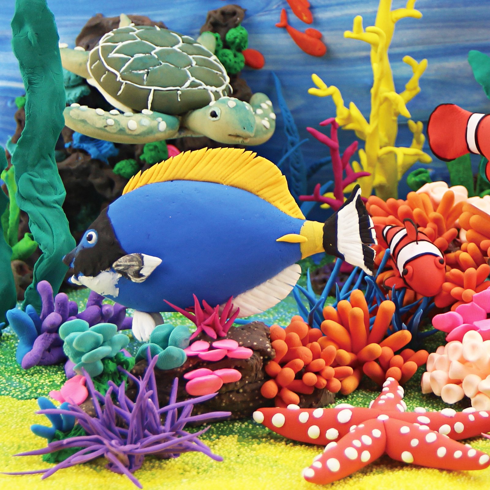 A coral reef scene modelled in bright air dry clay