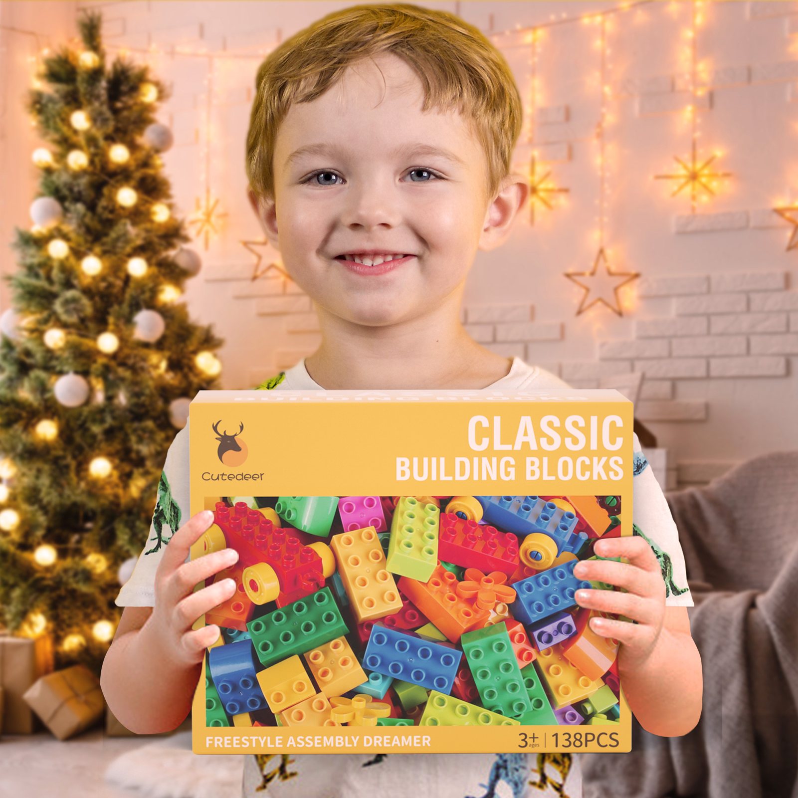 A boy holding a box of classic big building blocks