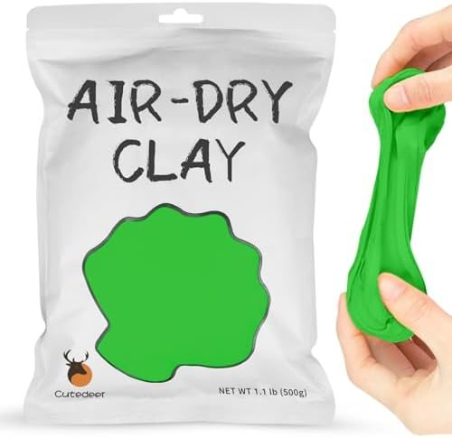 Sealed bag of Cutedeer green air dry clay next to modelled green leaves