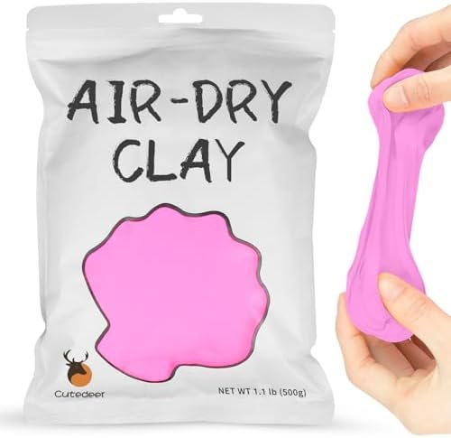 Sealed bag of Cutedeer pink air dry clay beside a small pink modelled flower